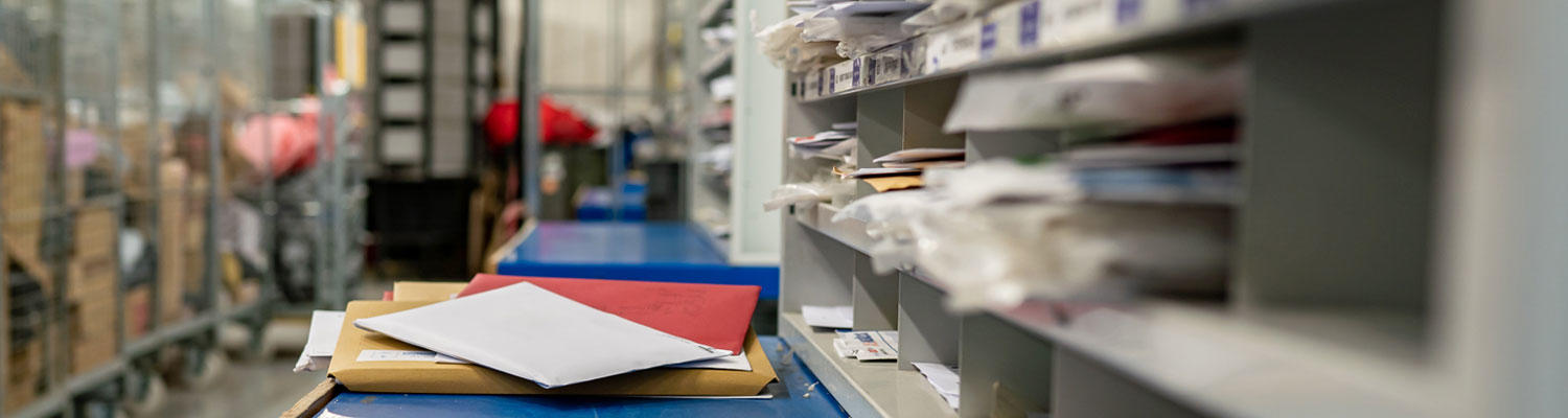 IDS Mail Incoming service image showing what the inside of an incoming mail sorting room looks like.