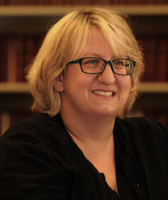 A head shot of Aly Jabrocki the Manager of the State of Colorado State Archives and the State Archivist