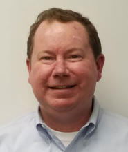 A head shot of Tom Montross the Director of Division of Central Services